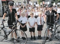 Pedalling pair raise cash for the primary