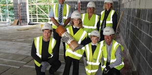 Time capsule placed to mark school building