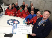 Okehampton Lions give thousands to North Dartmoor Search and Rescue Team