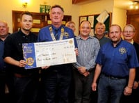 Okehampton Lions Club present cheque to Children's Hospice South West