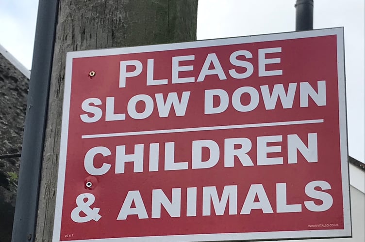 slow down sign