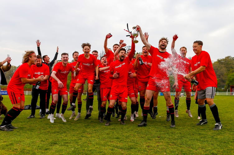 Captains Ben Cross and Lewis Daw lift the Western League Premier Division title