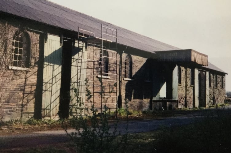 The goods shed at Okehampton beside railway station back in late 1990s before work to convert it into a youth hostel by John Elson