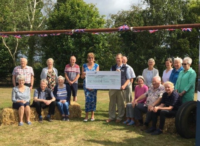 Exbourne Community Choir cheque presentation to Farming Community Network