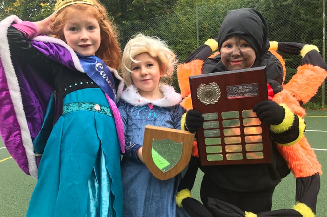 Carnival princesses Hester and Bridget Parker-Bray, six and four, and Louie Woodman, who was overall winner in the children’s classes at the South Zeal Carnival