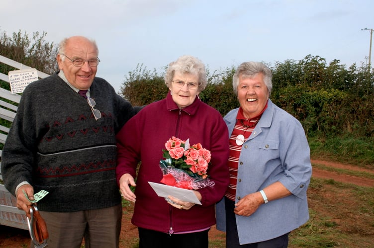 Bonzo and Joyce with Sheila Kerslake, then ploughing match secretary, on their 57th wedding anniversary.