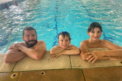 Dad and sons complete swim challenge