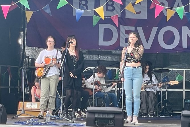 Youngsters singing on the BBC Radio Devon stage.  AQ 2886
