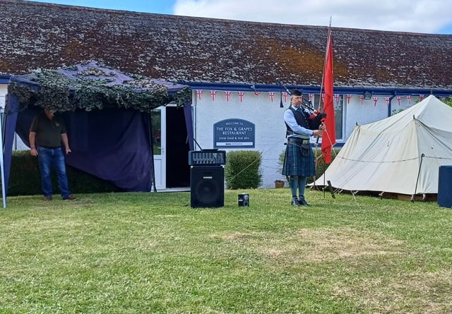 Lifton D-Day 80 celebrations included this Billy Millin bagpiper tribute - Billy (an unarmed musician) kept up morale during the fighting.