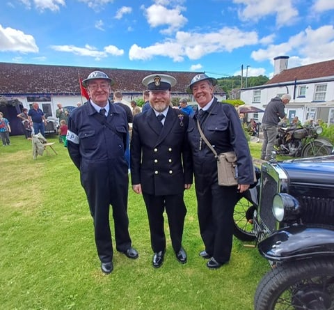 Lifton D-Day car display, a serving sailor and period air raid wardens..