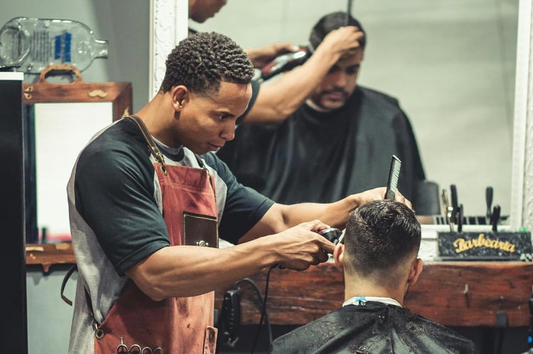 man getting hair cut