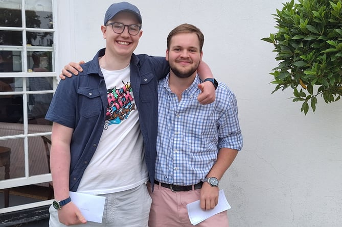 Shebbear College students Matt Freeman and Toby Shephard collecting their results