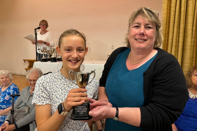 Imogen receives the Children’s Cup from the President, Jenny Lee.  AQ 1067