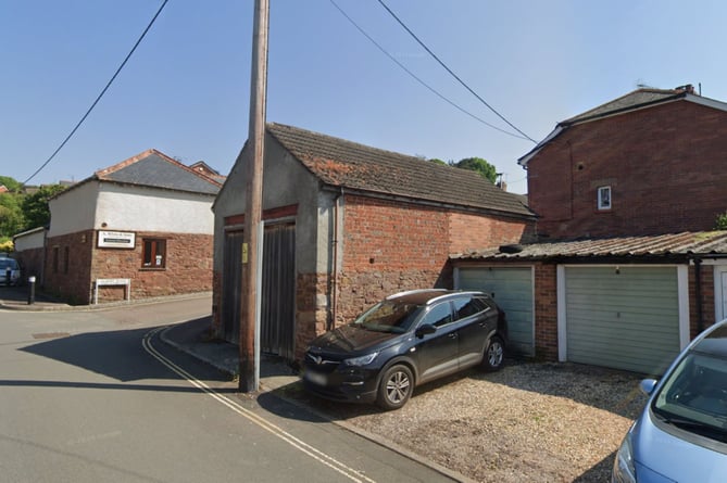 Disused building and two adjoining garages on Deep Lane, Crediton