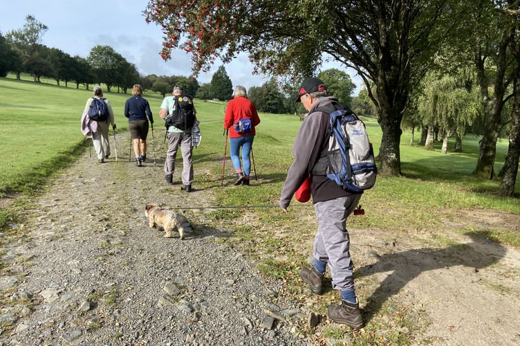 Members of Okehampton Rambling Club cross the golf club as they take advantage of the weather for an impromptu outing on Sunday