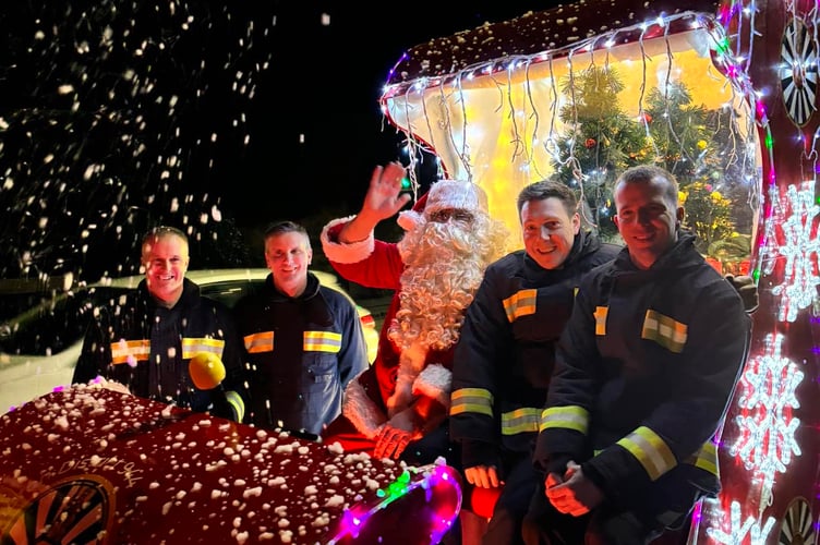 Okehampton Round Table members with Santa on their sleigh, which heads off around the town and nearby villages next week to share Christmas joy