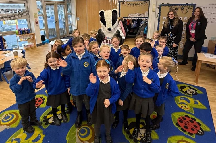 Ernesettle School Reception class meet Bob the Badger, who is encouraging them to brush their teeth